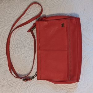 The Sak coral leather purse